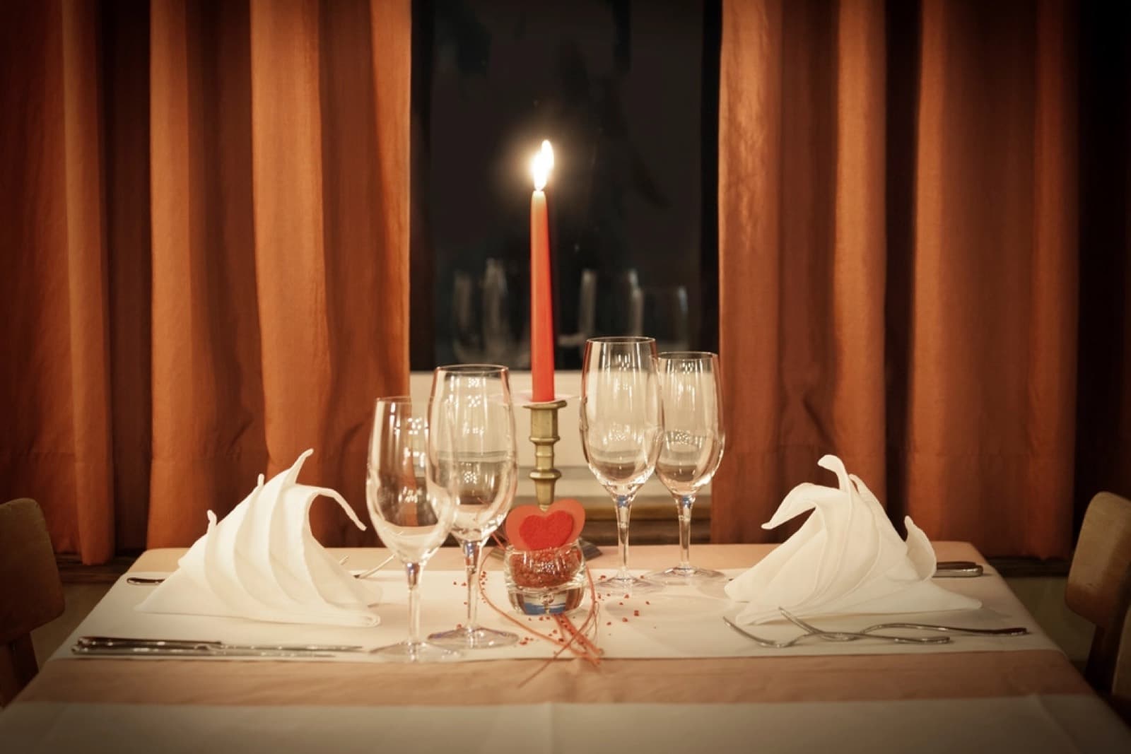 A set table by candlelight